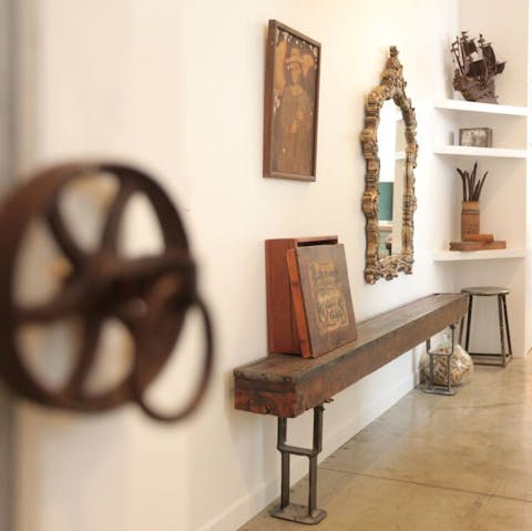 Appreciate the beautiful collection of antiques dotted throughout the home