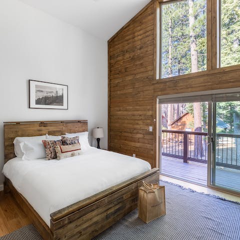 Wake up to forest views from the comfort of your bed each morning