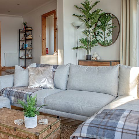 Light the fire and make yourself at home in the cosy living space