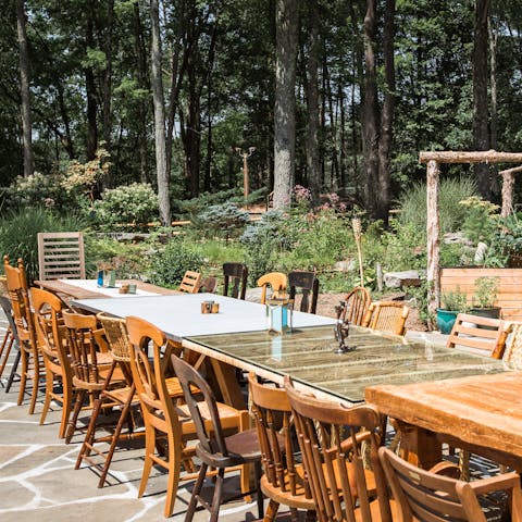 Sit down for lamplit evening meals in the great outdoors