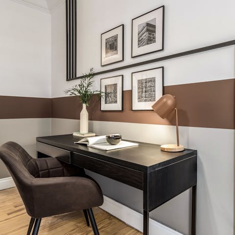 Work from the desk in the living room while away in Spain's capital city