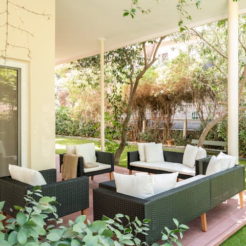 Relax with a glass of ouzo on the shaded terrace