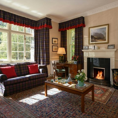 Relax with a glass of whisky by the fire after a busy day