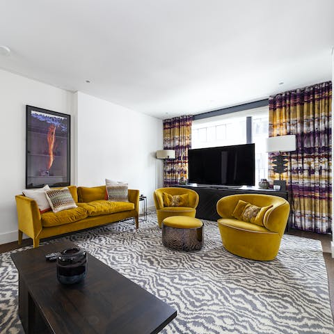 Unwind in the stylish living area with a good book