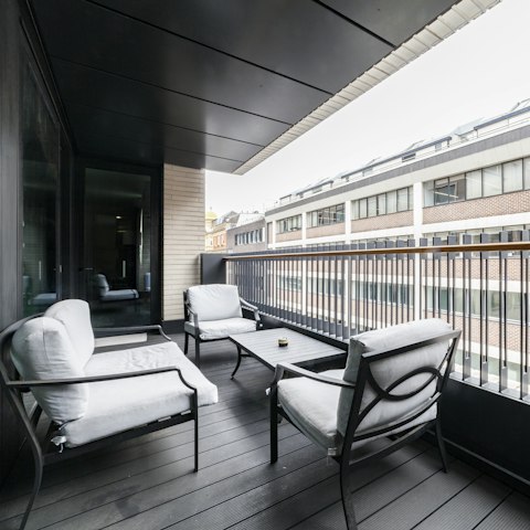 Enjoy a glass of wine on your private terrace before heading to the theatre