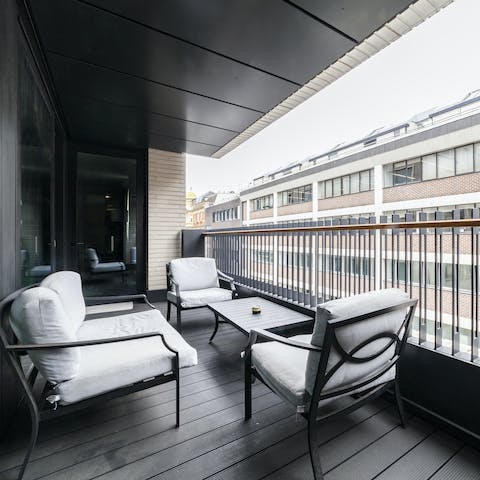 Enjoy a glass of wine on your private terrace before heading to the theatre
