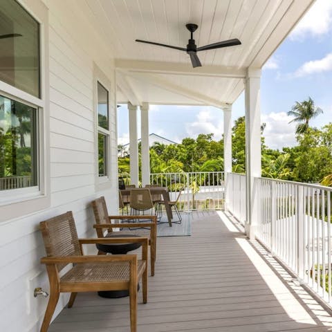Sip a morning coffee overlooking the palm-filled garden