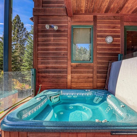 Soak in the hot tub as the sun goes down