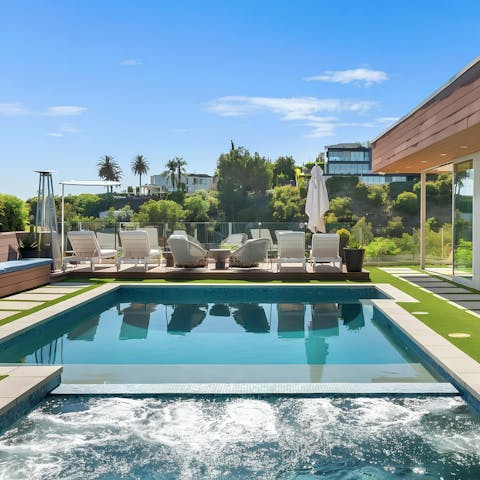 Soak in the private pool or hot tub with a view