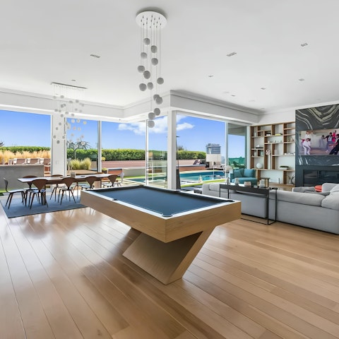 Relax, dine or play pool in the open-plan living space