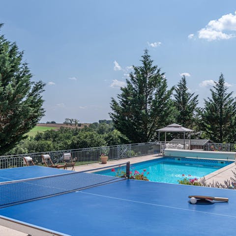 Dry off after a dip in the pool and play a few sets of table tennis