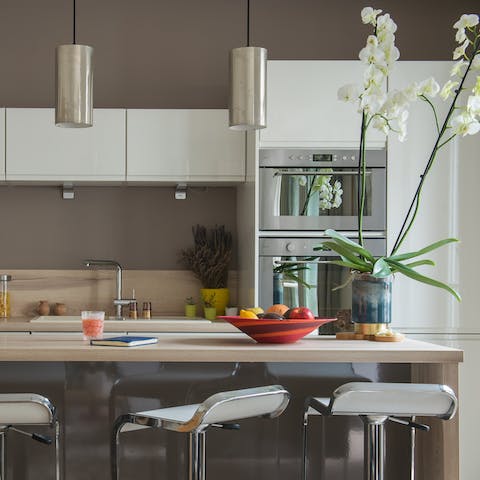 Whip up some ratatouille in the chic, modern kitchen for lunch