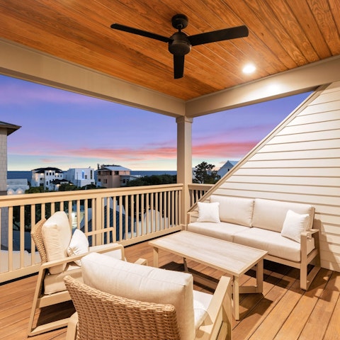 Admire the sunset from the private balcony
