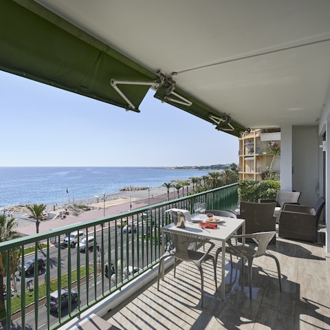 Dine alfresco on the balcony with views across the promenade