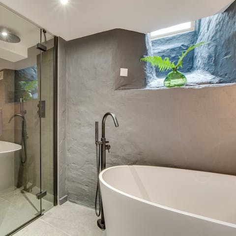 Treat yourself to a rejuvenating soak in the freestanding bathtub