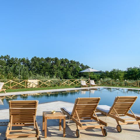 Soak up the Tuscan sun by the swimming pool