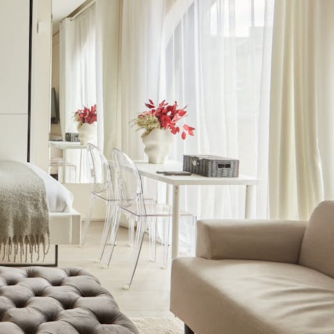 Take a seat at the bright desk and get some work done