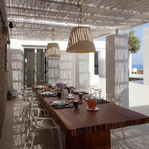 Devour dolmades and stuffed tomatoes on the shaded terrace