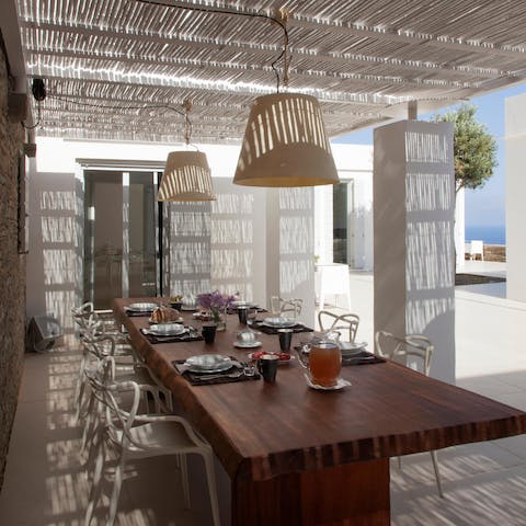 Devour dolmades and stuffed tomatoes on the shaded terrace