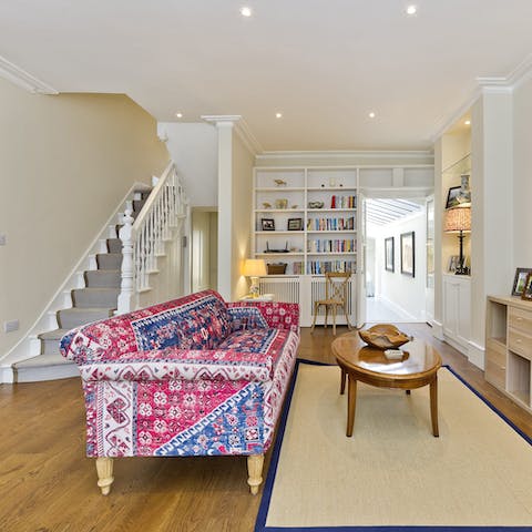 Unwind with a book from the library in the living room