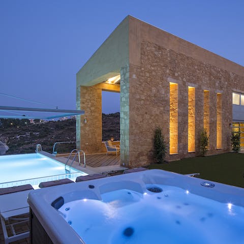 Sip wine as you soak into the hot-tub at night