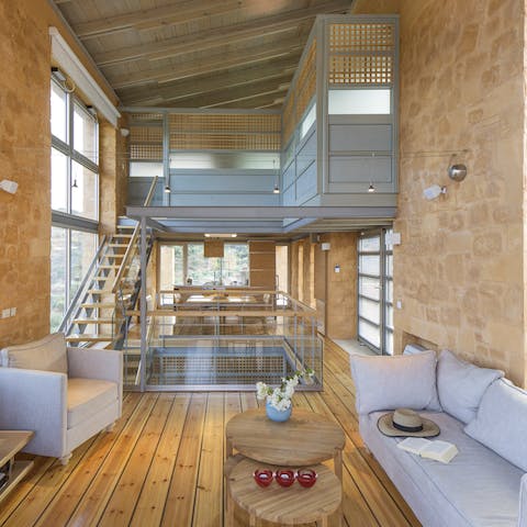 Admire the minimalist interiors against the rustic chunky architectural form