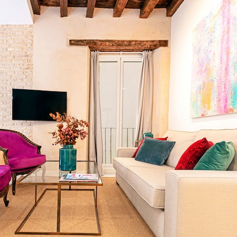 Take time to relax and watch the smart TV on the plush sofa after a long day of exploring and walking