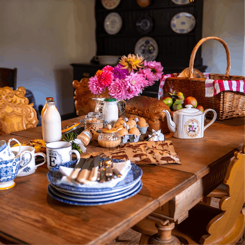 Tuck into a delicious meal prepared by the on-site caterers