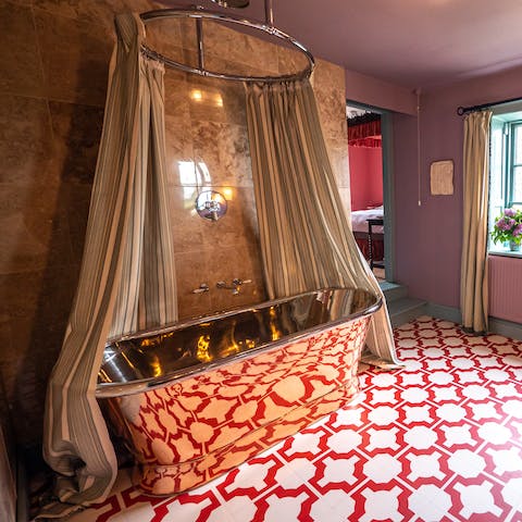 Enjoy a relaxing soak in one of the stunning copper bathtubs