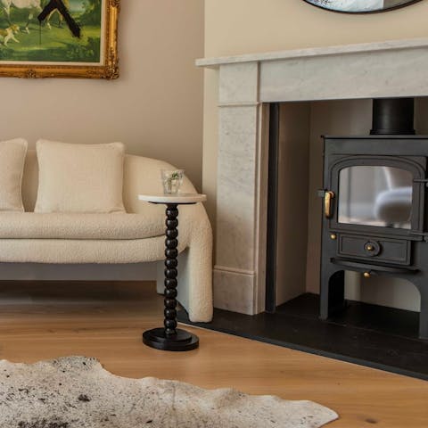 Warm up by the log burner when the Somerset weather turns cooler