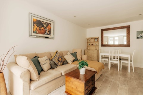Curl up in a calm living room with garden light flooding in