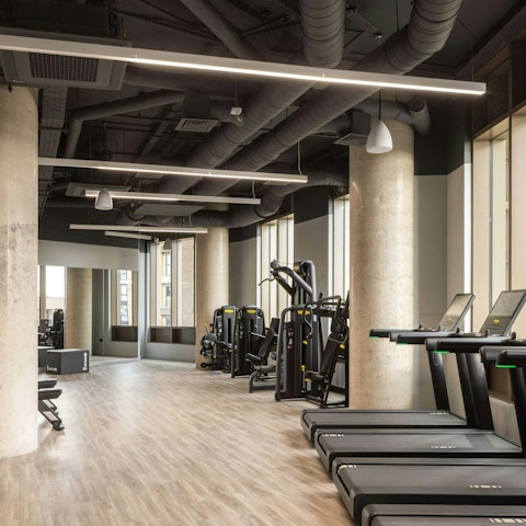 Squeeze in a morning workout in the impressive, shared gym