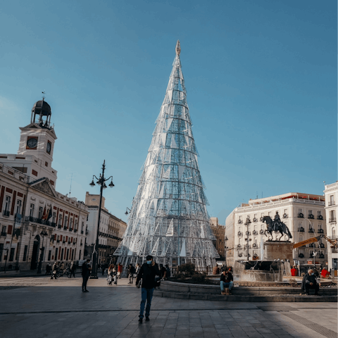 Walk just a few metres to Puerta del Sol – you're in the heart of the city here