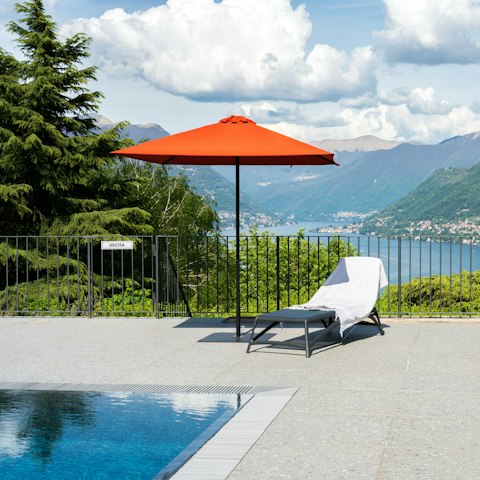 Lounge by the shared pool with lake views