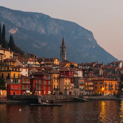 See the sunset over Lake Como