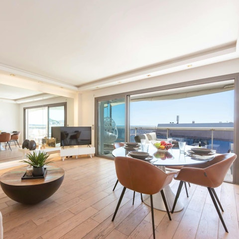 Open the sliding glass doors to connect the indoor and outdoor living spaces