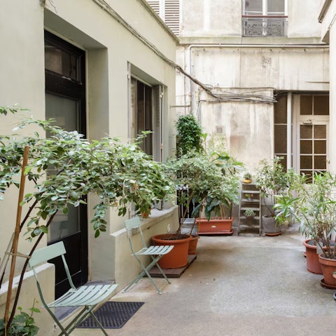 Stay in a tranquil interior courtyard with plenty of greenery