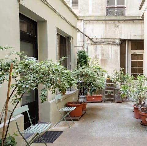 Stay in a tranquil interior courtyard with plenty of greenery