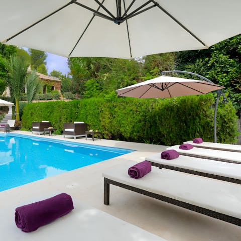 Lounge by the pool with a good book