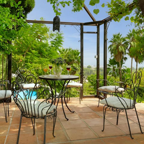 Open a glass of wine and enjoy it in the lush gardens