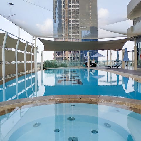 Cool of from the Dubai sun in the communal swimming pool and spa