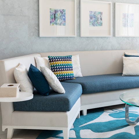 Stretch out in the comfort of your apartment's lounge area with skyscraper views over the city