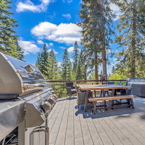 Fire up the barbecue as pine trees tower overhead