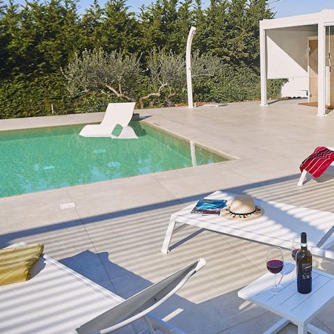 Lounge by the private pool, soaking up the sunshine