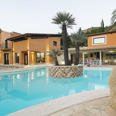 Take refreshing dips in the pool and enjoy the outdoor Jacuzzi