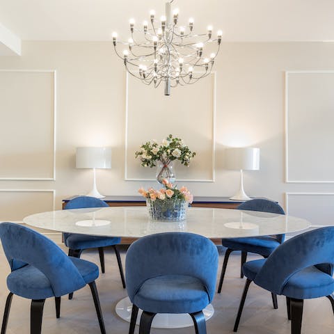 Dine under a beautiful chandelier