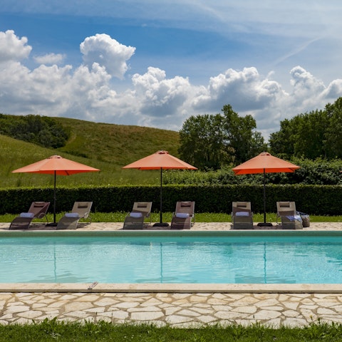 Find your spot by the pool for a leisurely afternoon