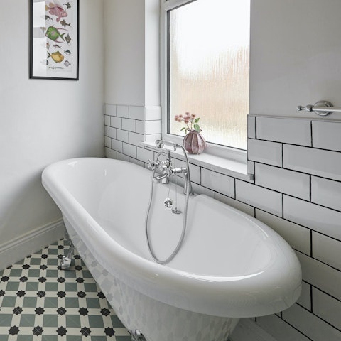 Unwind with a soak in the claw-footed bathtub