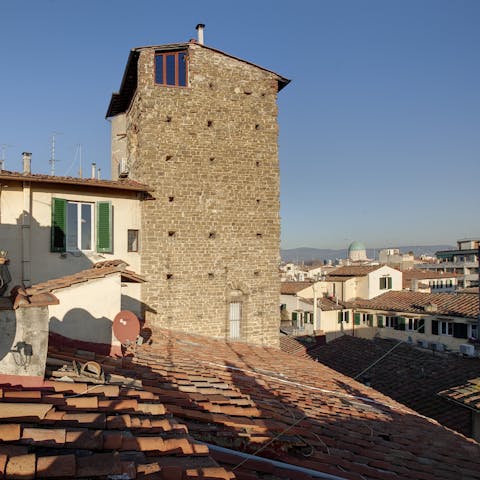 Stay in a medieval tower in the heart of the city 