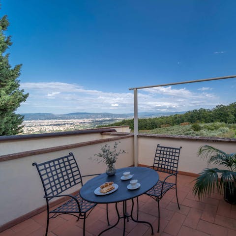 Take a moment for coffee and contemplation on the balcony